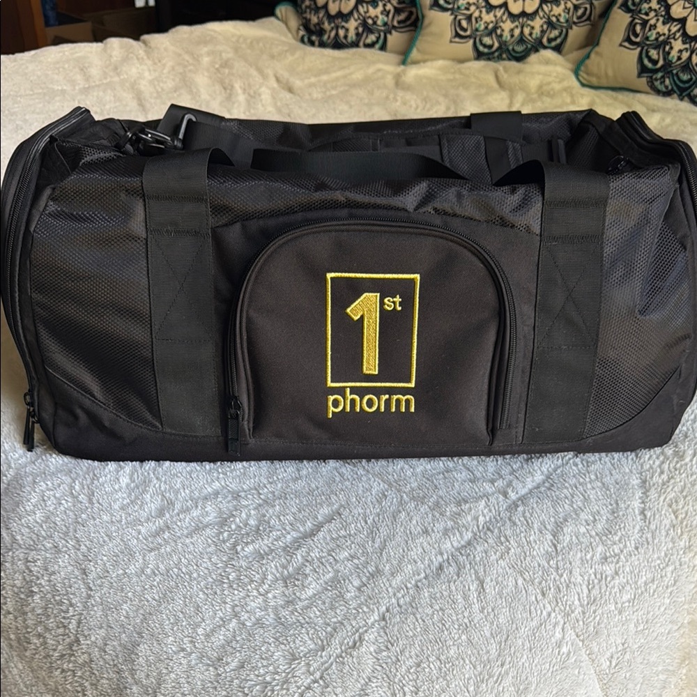 1st Phorm Black and Gold Duffel Bag with Durable Design